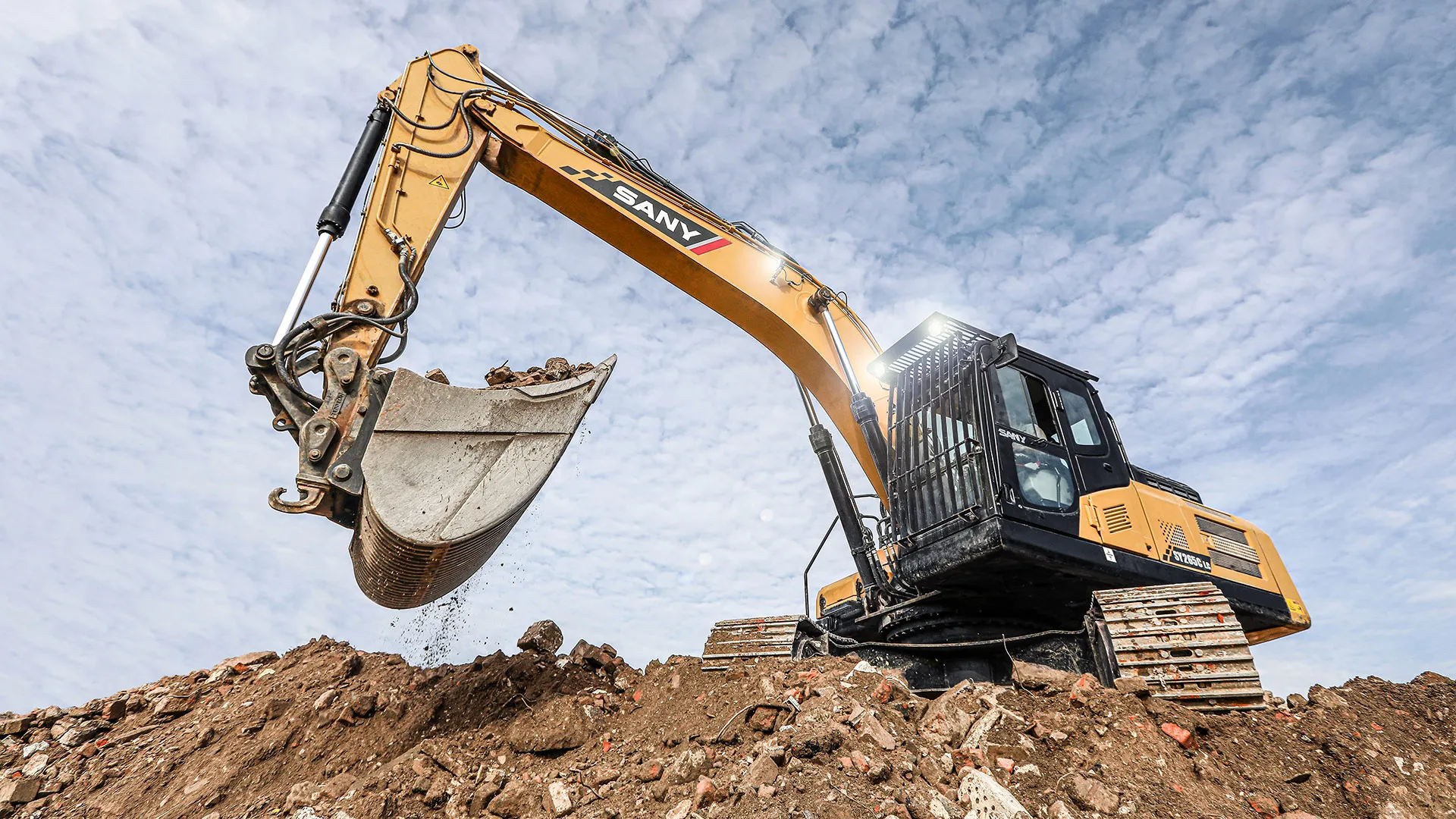 SANY excavator from the UES rental fleet on a job site